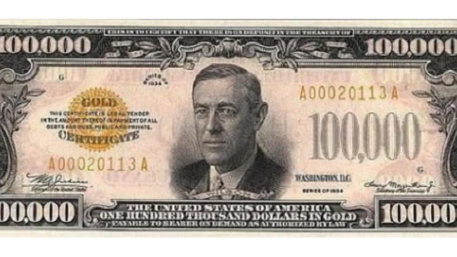 Woodrow Wilson 100,000 dollar bill in standard gold